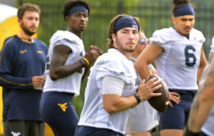 WVU quarterbacks to throw more than Rich Rodriguez is used to